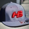 Headbanger Sports I8501 Cap America Flexfit Performance Trucker Mesh Back Hat: Graphite / Red -Baseball Shop 13 78642f5e c264 4044 8a61 cb87182afc08